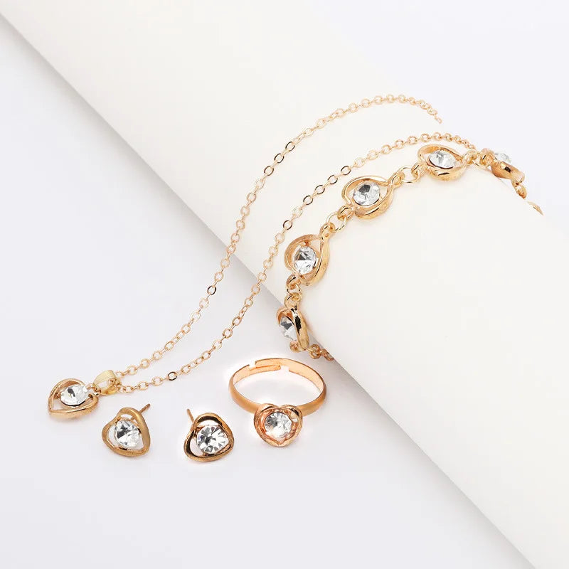 Women Crystal Love Jewelry 4 Piece Set Fashionable Elegant High End Peach Heart Necklace Earrings Rings Bracelets Necklace Set